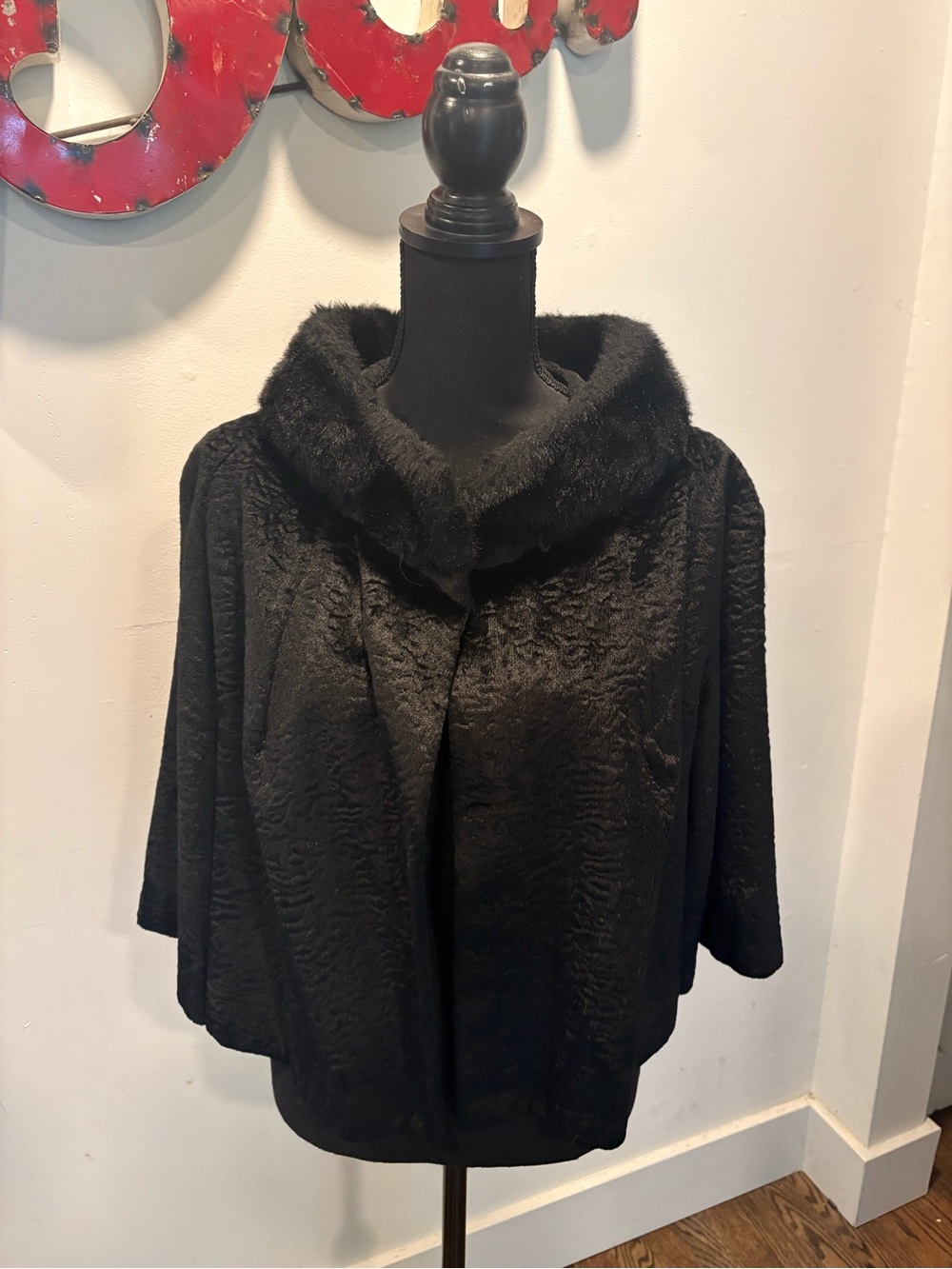 Vintage black bolero/shrug with faux fur collar.